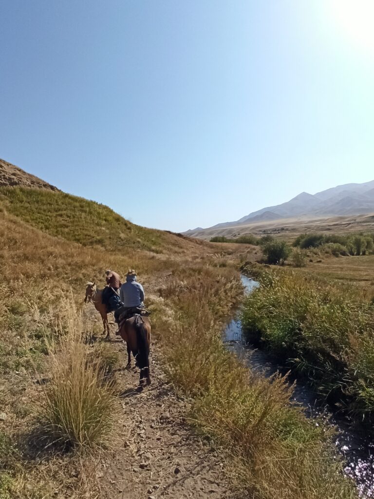 Down by the river, still learning to ride